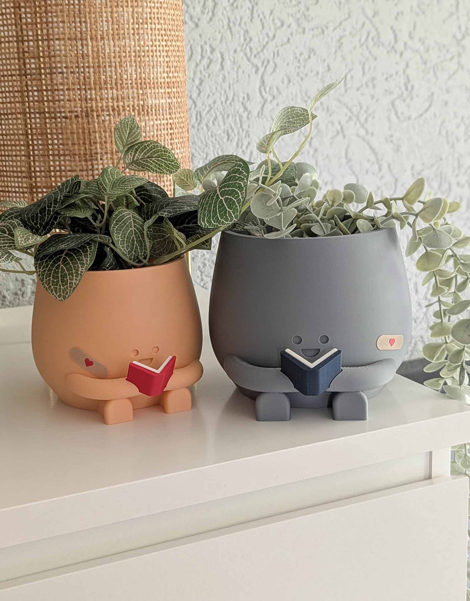 Happy reading imperfect plant pot