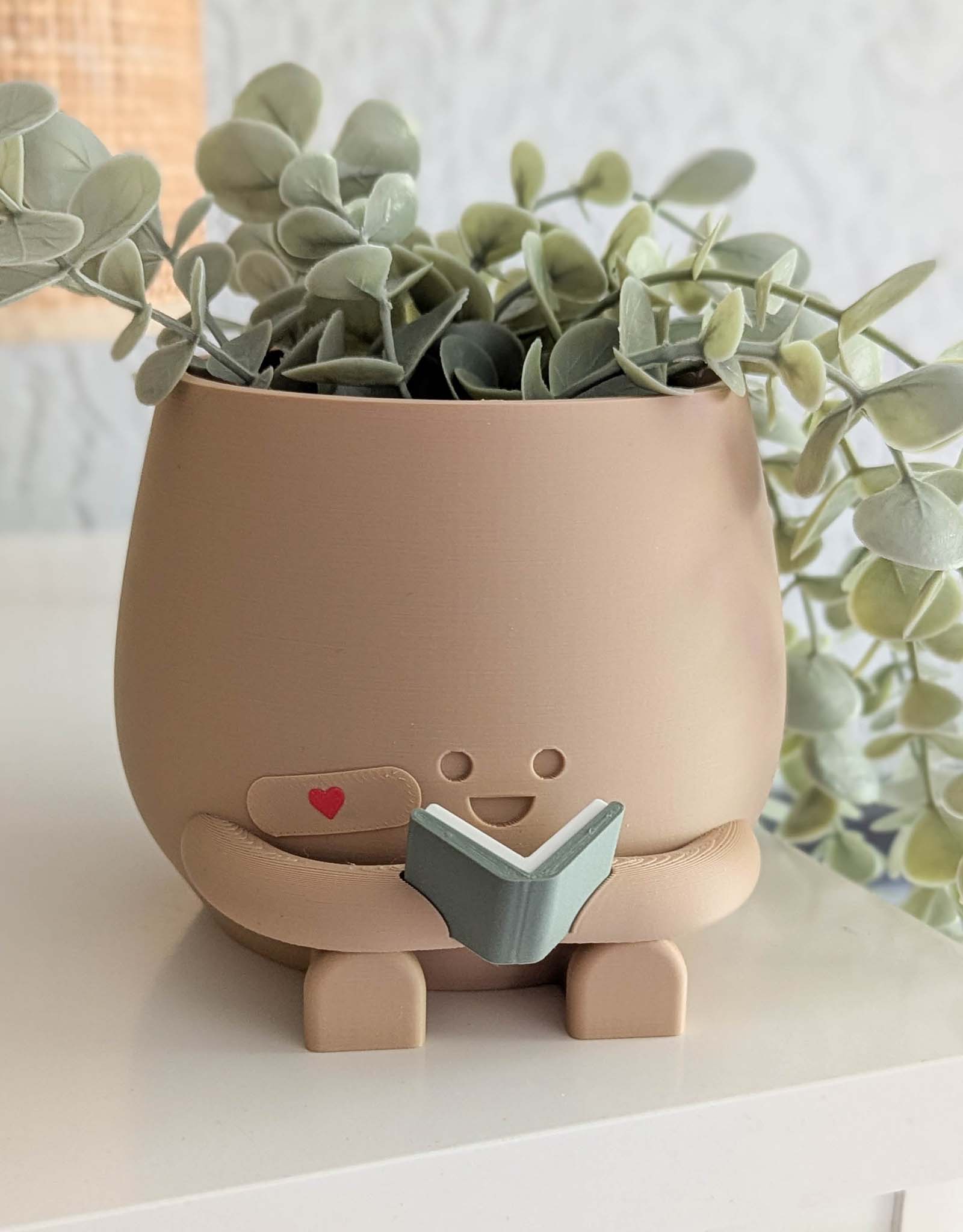 Happy reading imperfect plant pot