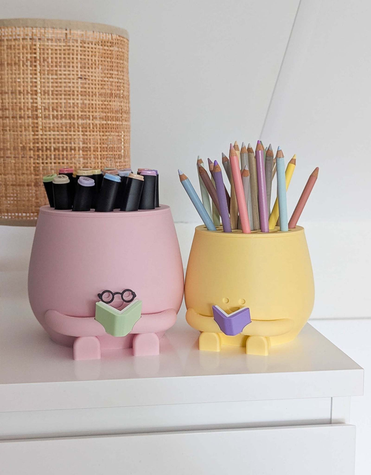 Happy pencil holder with a book
