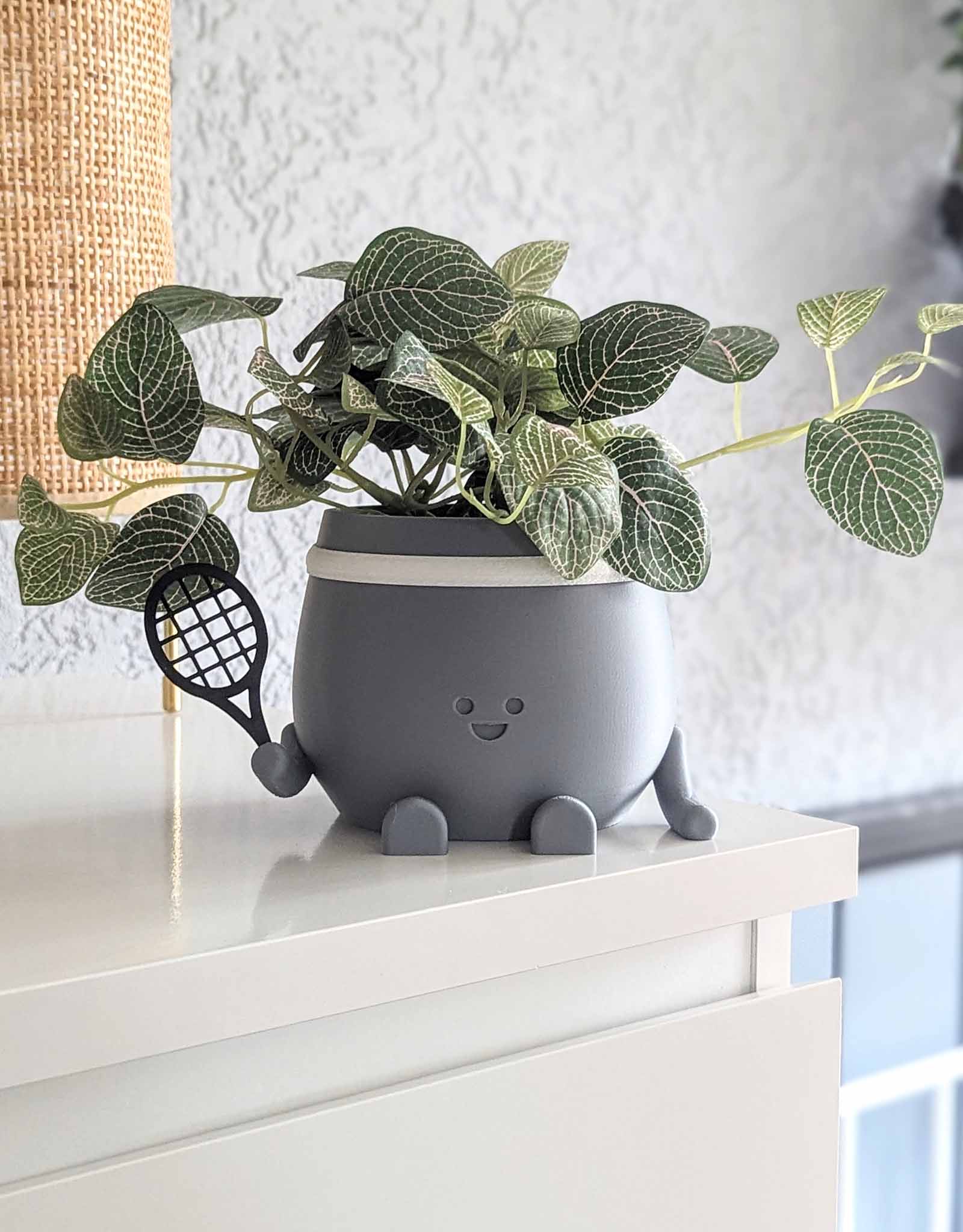 Happy tennis plant pot