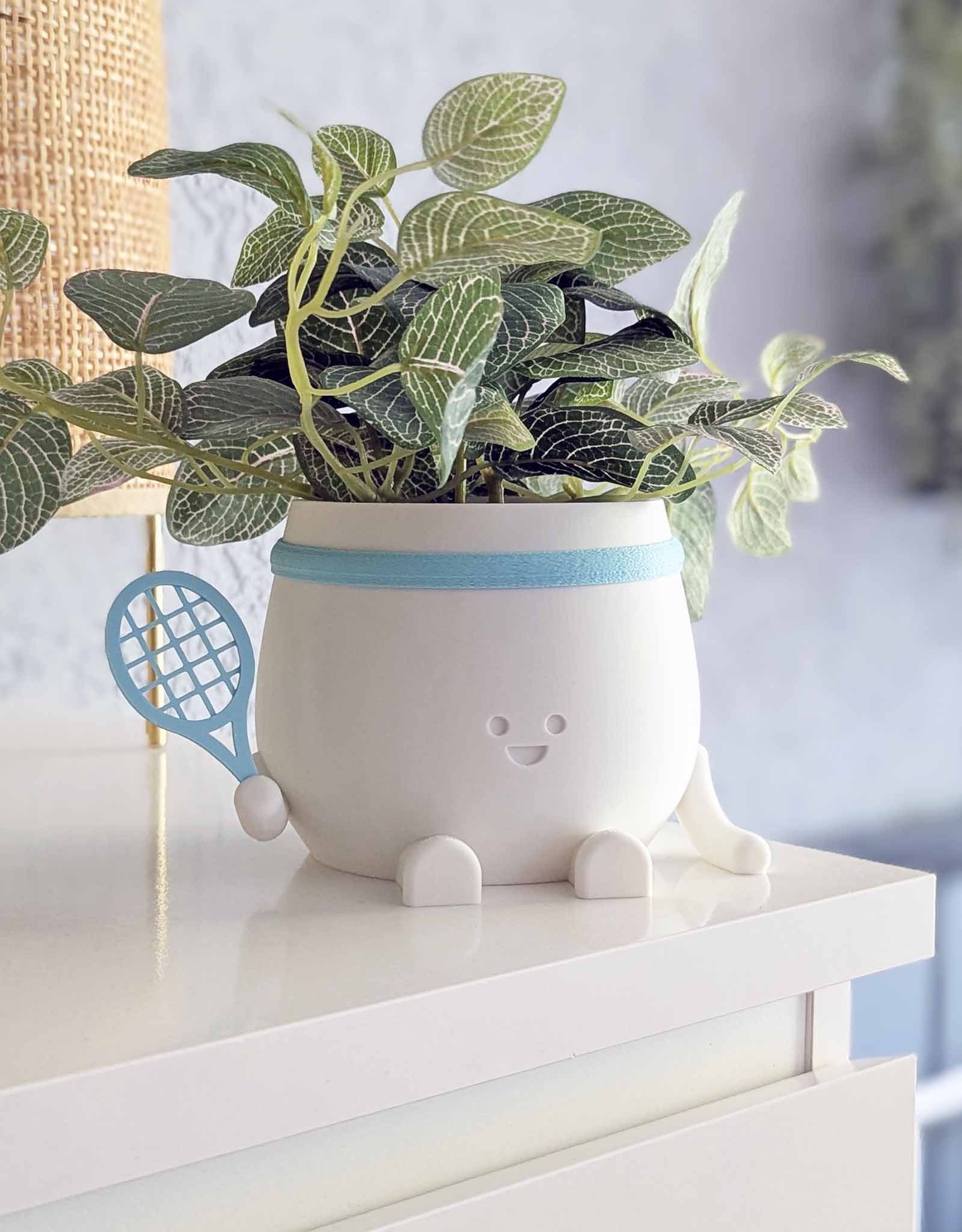 Happy tennis plant pot