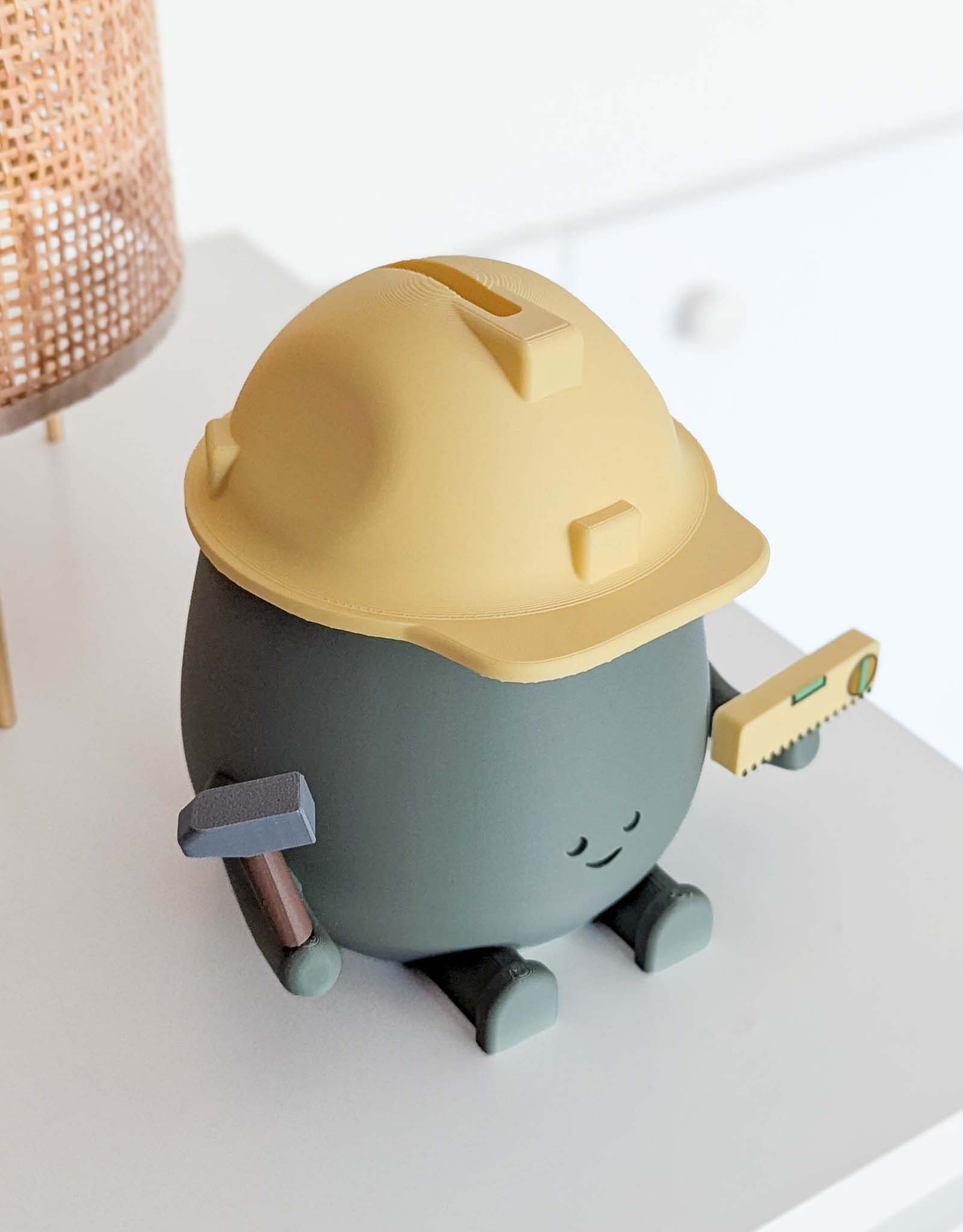 Happy construction worker piggy bank