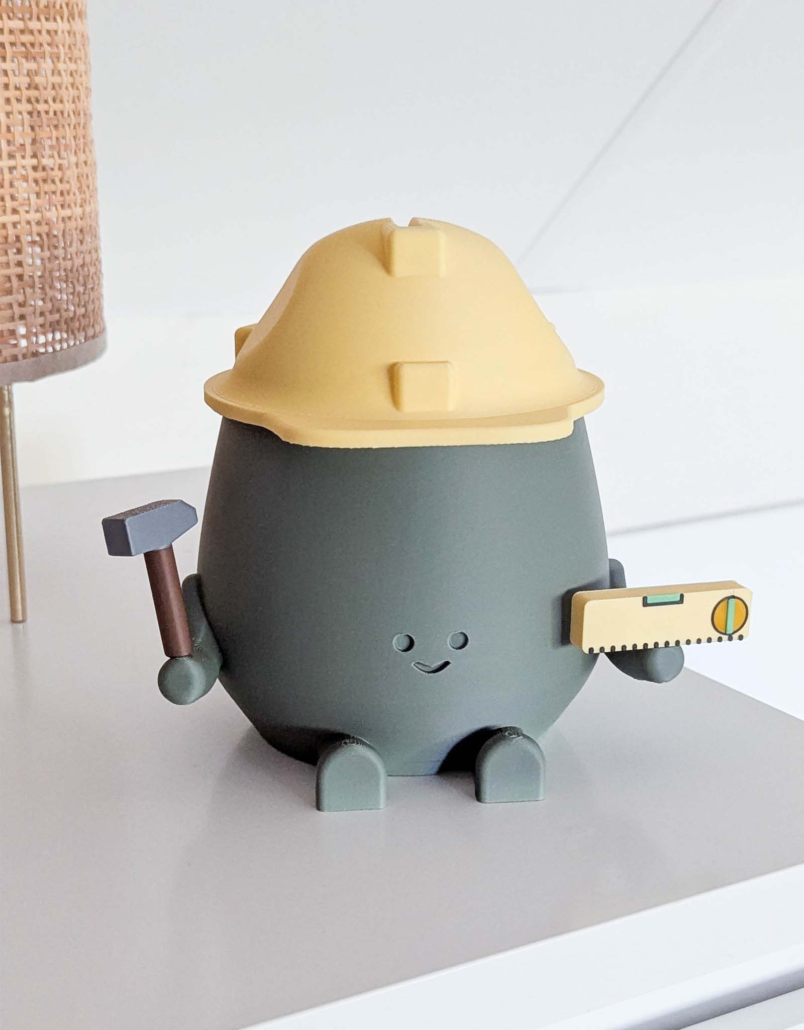 Happy construction worker piggy bank
