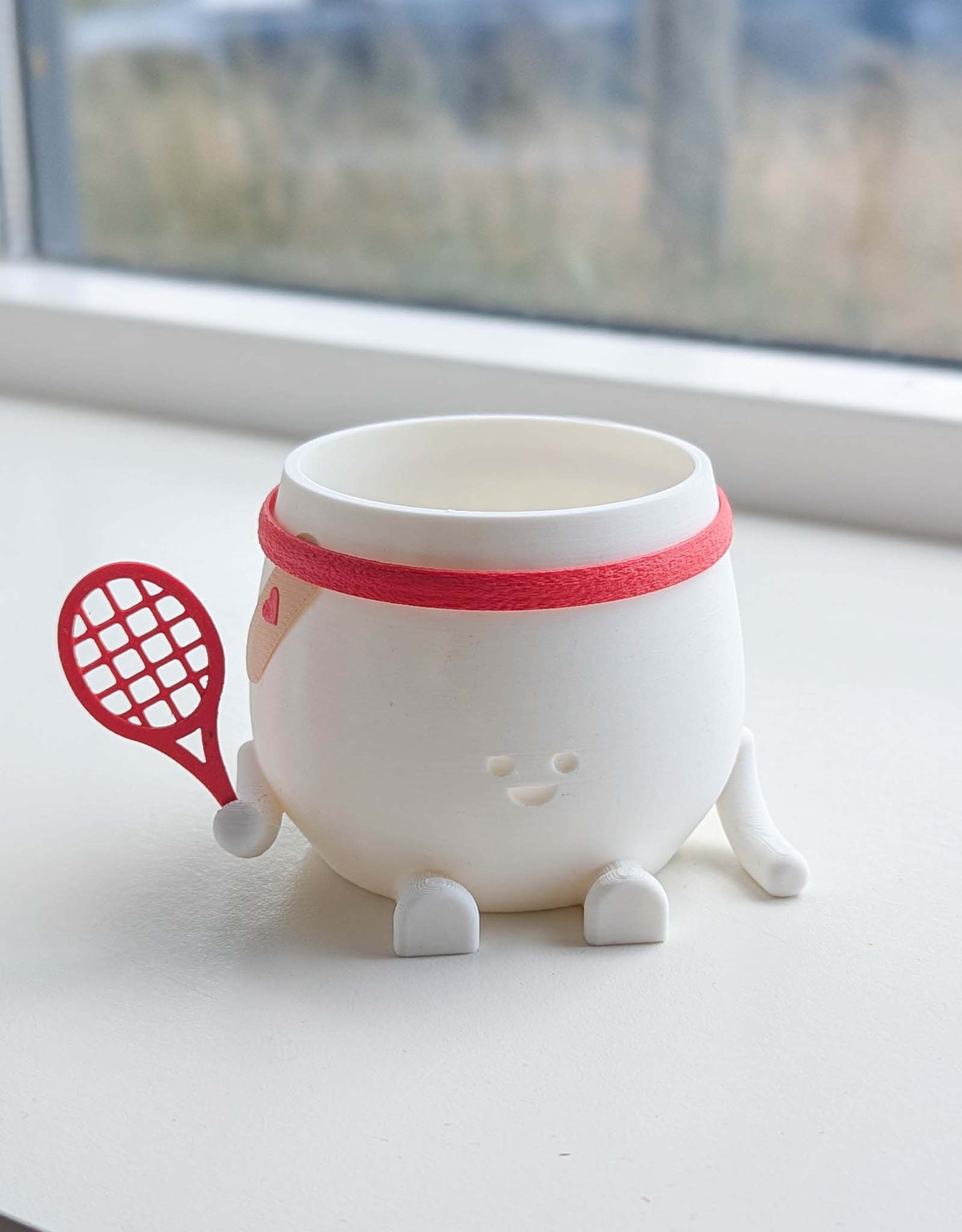 Happy imperfect tennis plant pot