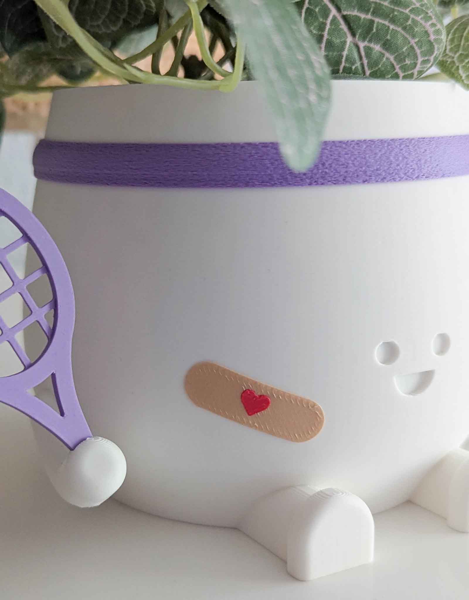 Happy imperfect tennis plant pot