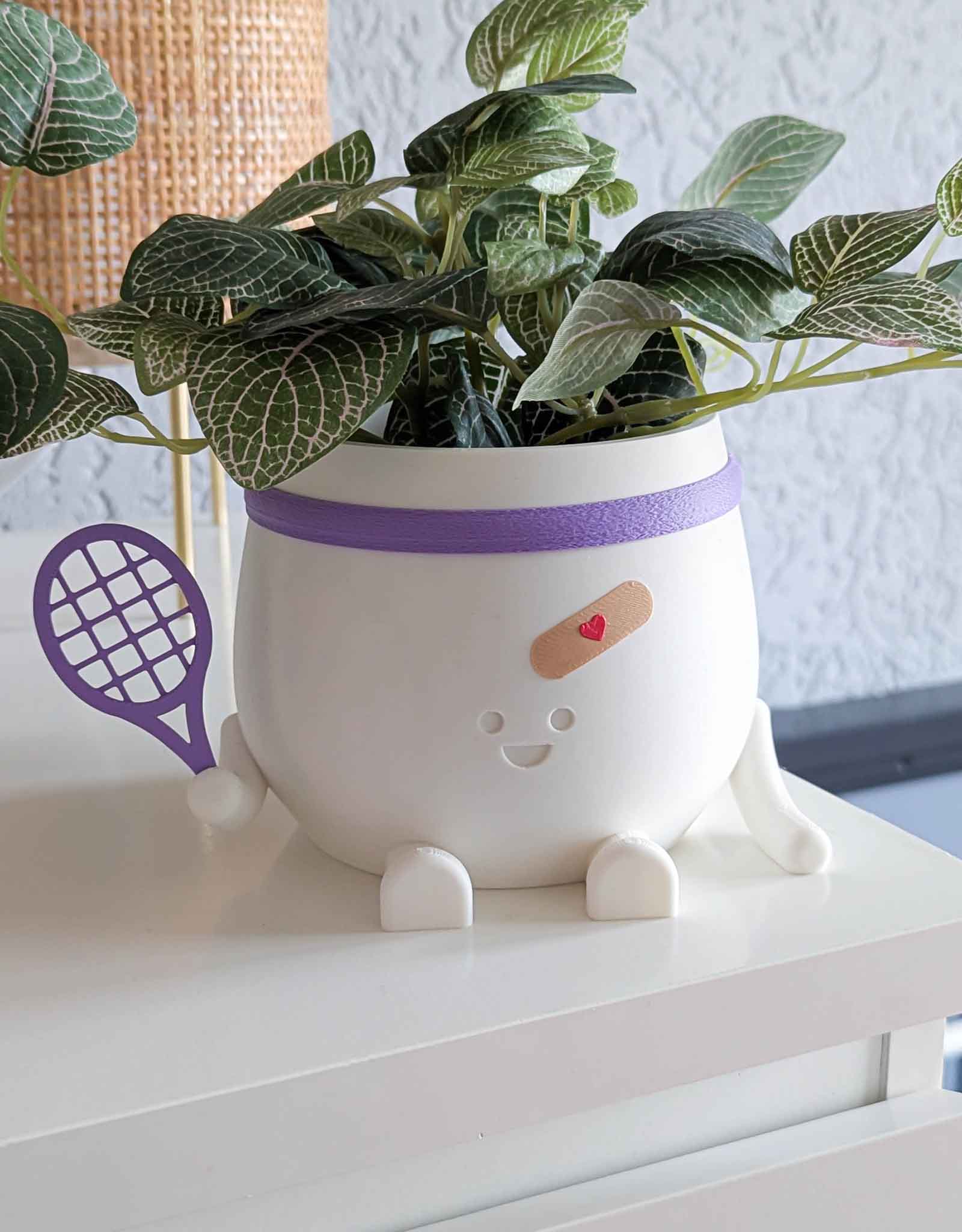 Happy imperfect tennis plant pot